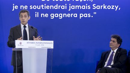 Nicolas Sarkozy et Pierre Lellouche, lors d'une réunion Les Républicains, à Paris, le 15 juin 2016.&nbsp; (MAXPPP)