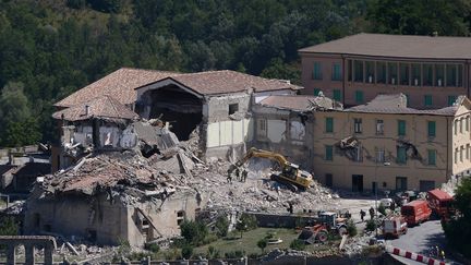 A Amatrice, de nombreuses constructions se sont &eacute;croul&eacute;es &agrave; cause du s&eacute;isme de mercredi (FILIPPO MONTEFORTE / AFP)