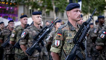 Soldiers from the Franco-German brigade during rehearsals for the July 14 military parade in Paris, July 9, 2019 (SEBASTIEN MUYLAERT / MAXPPP)