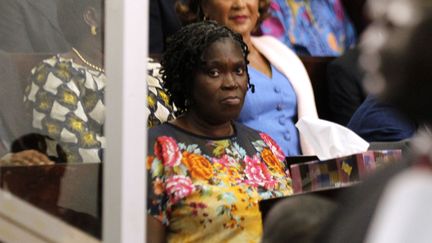 Simone Gbagbo, l'&eacute;pouse de Laurent Gbagbo et ex-premi&egrave;re dame de C&ocirc;te d'Ivoire, lors de son proc&egrave;s &agrave; Abidjan, le 26 d&eacute;cembre 2014. (LUC GNAGO / REUTERS)