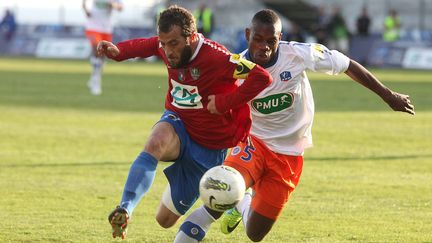 Louis Poggi a joué un mauvais tour à Henri Bedimo. (PIERRE-ANTOINE FOURNIL ET JEAN P / MAXPPP)