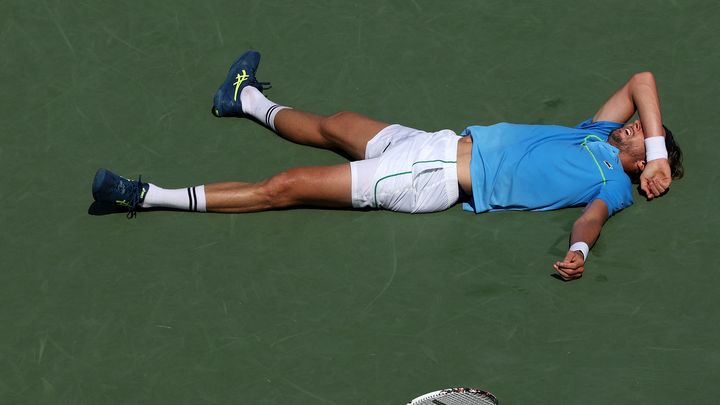 Le Français Arthur Rinderknech au sol lors de son match du 2e tour de l'US Open contre Andrey Rublev, le 28 août 2024 (MATTHEW STOCKMAN / AFP)