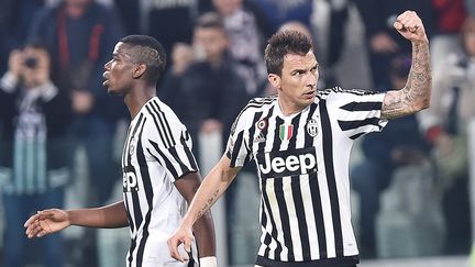 Paul Pogba et Mario Mandzukic, les deux buteurs de la Juventus contre le Milan AC (DI MARCO / ANSA)