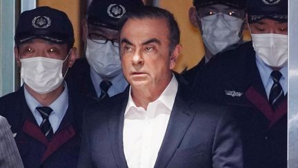 Carlos Ghosn lors de sa deuxième libération sous caution, le 25 avril 2019, à Tokyo (Japon). (YOICHI HAYASHI / YOMIURI / AFP)