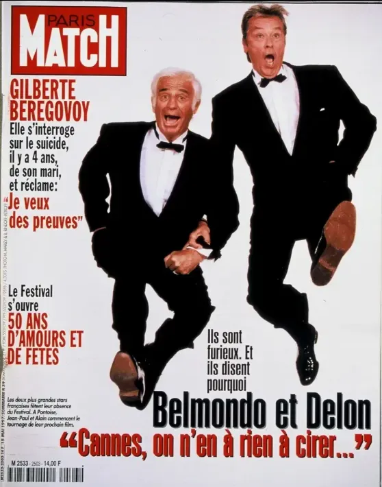 Jean-Paul Belmondo et Alain Delon en couverture de "Paris Match" pour s'indigner d'avoir été oubliés du gala fêtant les 50 ans du Festival de Cannes, en mai 1997. (PARIS MATCH)