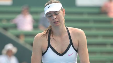 Maria Sharapova, le 14 janvier 2020, souffrant de la&nbsp;mauvaise qualité de l'air pendant un match de gala à Melbourne (sud-est de l'Australie).&nbsp; (MIKE OWEN / GETTY IMAGES ASIAPAC)