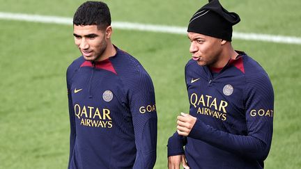 Achraf Hakimi and Kylian Mbappé in training on September 29, 2023. (FRANCK FIFE / AFP)