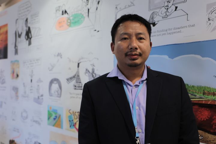 Tshering Tashi, membre de la délégation du Bhoutan, assiste à la COP26 à Glasgow (Ecosse), le 31 octobre 2021. (CAMILLE ADAOUST / FRANCEINFO)