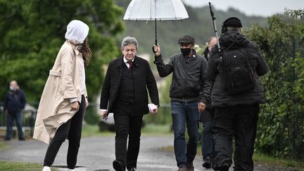 Jean-Luc Melenchon lors de son arrivée à son premier meeting, le 16 2021, à Aubin.&nbsp; (LIONEL BONAVENTURE / AFP)