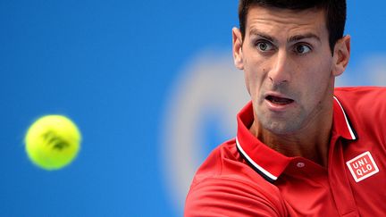 Novak Djokovic a facilement passé le premier tour à Pékin (GOH CHAI HIN / AFP)