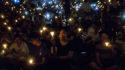 Environ 180 000 Hongkongais ont participé à la veillée annuelle en mémoire des victimes de la place Tiananman, le 4 juin 2019. (ISAAC LAWRENCE / AFP)