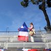 Une militante du Rassemblement national aux Universités d'été du parti, à Fréjus, le 12 septembre 2021. (VALERY HACHE / AFP)