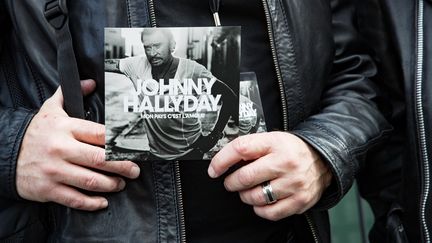 L'album posthume de Johnny Hallyday, "Mon pays c'est l'amour". (GEOFFROY VAN DER HASSELT / AFP)