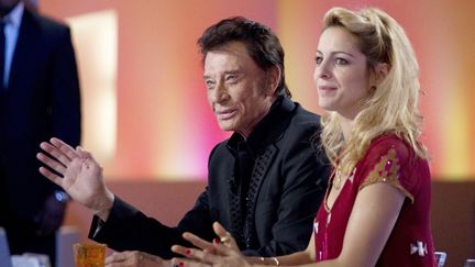 Johnny Hallyday et sa partenaire Audrey Dana, sur le plateau du &quot;Grand Journal&quot;
 (JOEL SAGET / AFP)