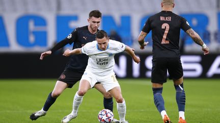 Florian Thauvin a été chahuté par les défenseurs de Manchester City  (GUILLAUME HORCAJUELO / POOL / EPA POOL)