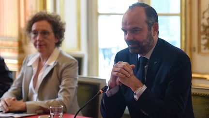 Edouard Philippe et Muriel Pénicaud, lors de la réception des partenaires sociaux à Matignon, le 18 juin 2019. (LUCAS BARIOULET / POOL)