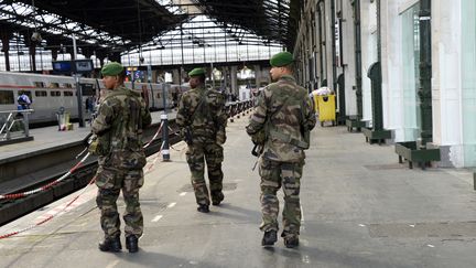 Patrouille en gare de Lyon, en 2014. (BERTRAND GUAY / AFP)