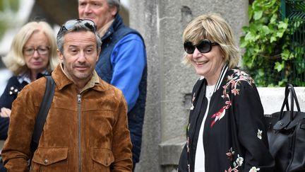 Le photographe Sébastien Valiela aux côtés de la directrice de son agence, BestImage, Mimi Marchand.&nbsp; (ERIC FEFERBERG / AFP)