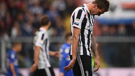 La détresse de l'attaquant de la Juventus, Mario Mandzukic.