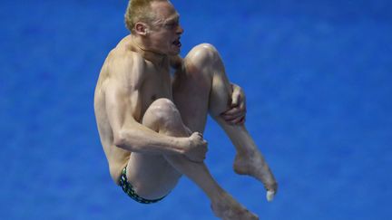 Le Russe&nbsp;Ilia Zakharov lors de la finale du plongeon de 3m aux championnats d'Europe de natation &agrave; Berlin (Allemagne), le 21 ao&ucirc;t 2014. (MICHAEL DALDER / REUTERS)