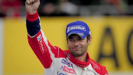 S&eacute;bastien Loeb apr&egrave;s sa victoire dans le Rallye de Catalogne, le 23 octobre 2011. (JOSEP LAGO / AFP PHOTO)