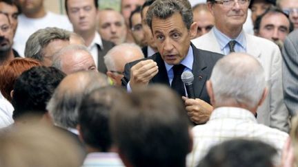 Nicolas Sarkozy lors d'une visite d'usine à Damazan (Lot-et-Garonne) le 30 juin 2011 (AFP - JEAN-PIERRE MULLER)