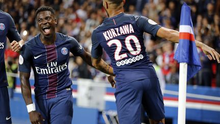 Serge Aurier et Layvin Kurzawa, deux joueurs achetés en L1 par le PSG (MATTHIEU ALEXANDRE / AFP)