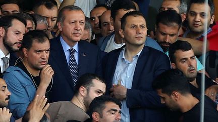 Le président turc Recep Tayyip Erdogan à l'aéroport d'Istanbul le 16 juillet 2016 (AFP/ Husseyin Aldemir)