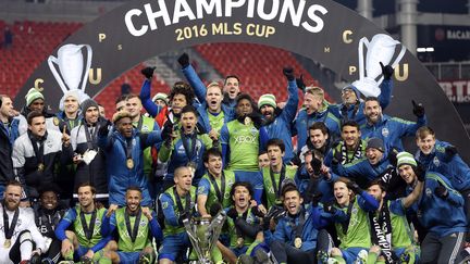 Les joueurs de Seattle, champions 2016 en MLS. (COLE BURSTON / AFP)