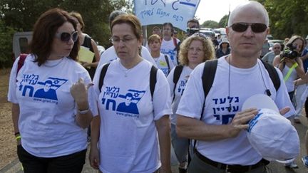 La marche de Noam et Aviva Shalit (à droite et au centre), les parents du soldat capturé, vers Jérusalem (27/06/2010) (AFP / Jack Guez)