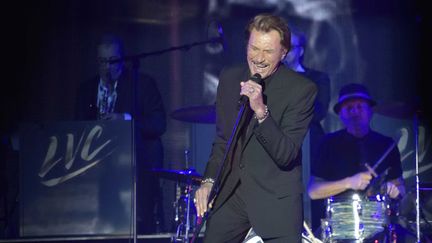 &nbsp; (Johnny Hallyday en concert en décembre 2014 avec les "Vieilles Canailles" © SIPA - Uncredited)