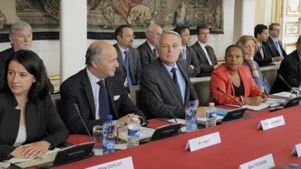 Le gouvernement Ayrault s'est réuni en séminaire lundi 25 juin à Matignon pour plancher sur le budget (PHILIPPE WOJAZER / POOL / AFP)
