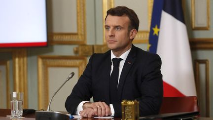 Emmanuel Macron durant une réunion en visioconférence du G7, le 19 février 2021. (THIBAULT CAMUS / AFP)
