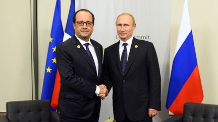 Fran&ccedil;ois Hollande et Vladimir Poutine &agrave; Brisbane (Australie), le 15 novembre 2014. (ALAIN JOCARD / POOL)