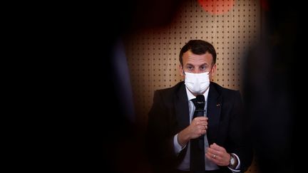 Emmanuel Macron le 14 février 2021. (CHRISTIAN HARTMANN / POOL / AFP)