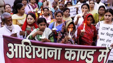 Des manifestants protestent contre les viols collectifs, &agrave; Lucknow (Uttar Pradesh, Inde), le 22 mars 2013. (MANOJ CHHABRA / THE TIMES OF INDIA / AFP)