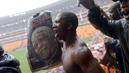 Les chants ont m&ecirc;me repris spontan&eacute;ment dans les gradins, au beau milieu des discours. Le vice-pr&eacute;sident de l'ANC Cyril Ramaphosa, Monsieur Loyal de la c&eacute;r&eacute;monie, a d&ucirc; plusieurs fois appeler au calme. (PEDRO UGARTE / AFP)