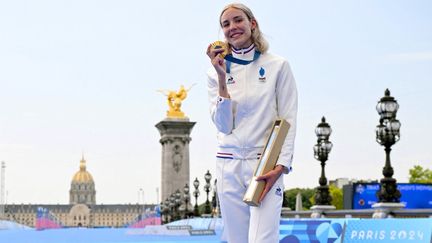 Cassandre Beaugrand won gold in the triathlon event at the 2024 Paris Olympics on July 31. (HAHN LIONEL / KMSP / AFP)