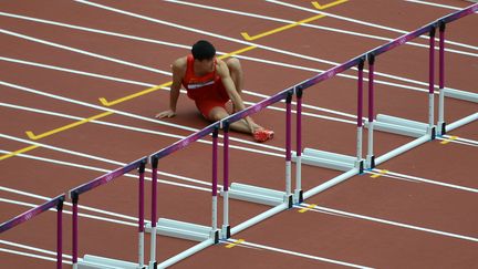 Un commentateur de la t&eacute;l&eacute;vision chinoise a r&eacute;v&eacute;l&eacute; jeudi 23 ao&ucirc;t qu'il savait que Liu Xiang&nbsp;&eacute;tait bless&eacute; avant sa chute aux JO, provoquant la col&egrave;re des internautes chinois et des soup&ccedil;ons de mise en sc&egrave;ne. (JOHANNES EISELE / AFP)