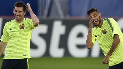 Messi et Neymar à l'entraînement (FRANCK FIFE / AFP)