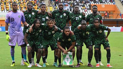 Les joueurs du Nigéria avant le match face au Bénin à l'occasion des éliminatoires pour la Coupe du monde 2026, le 10 juin 2024. (ISSOUF SANOGO / AFP)