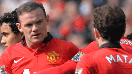 Wayne Rooney et Juan Mata se donnent l'accolade