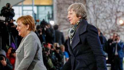 La chancelière allemande Angela Merkel et la Première ministre Theresa May à Berlin (Allemagne), mardi 11 décembre 2018. (ODD ANDERSEN / AFP)