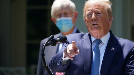 Le président américain Donald Trump lors d'une conférence de presse dans les jardins de la Maison blanche, à Washington, le 15 mai 2020. (MANDEL NGAN / AFP)