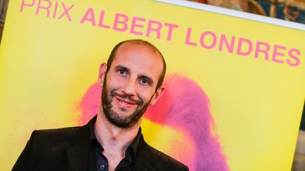 Philippe Pujol, lauréat du prix Albert-Londres 2014 dans la catégorie presse écrite, le 12 mai 2014 (THIBAUD MORITZ / MAXPPP)