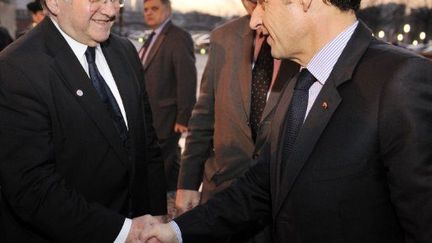 Claude Allègre et Nicolas Sarkozy en 2009 (ERIC FEFERBERG / ARCHIVES / AFP)