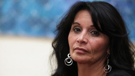 Veronique Bonazzola, une ancienne assistante d'éducation du collège catholique de Notre-Dame de la Tramontane à Juan-Les-Pins, pose dans le bureau de son avocat le 14 mai 2012 à Nice
 (JEAN-CHRISTOPHE MAGNENET / AFP)