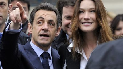 Nicolas Sarkozy et Carla Bruni le 21 mars dernier (2e tour des régionales) (AFP/PHILIPPE WOJAZER)