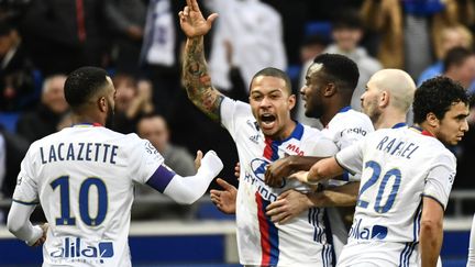 La joie de Memphis Depay et de ses coéquipiers. (JEFF PACHOUD / AFP)