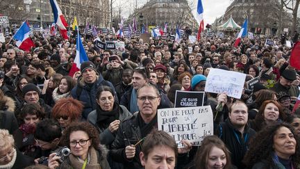 La "marche r&eacute;publicaine" organis&eacute;e &agrave; Paris le 11 janvier 2015 apr&egrave;s les attentats qui on vis&eacute; la capitale quatre jours plus t&ocirc;t. (ROLLINGER-ANA / ONLY FRANCE/ AFP)